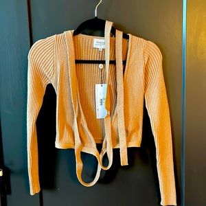 Long sleeve tan wrap top